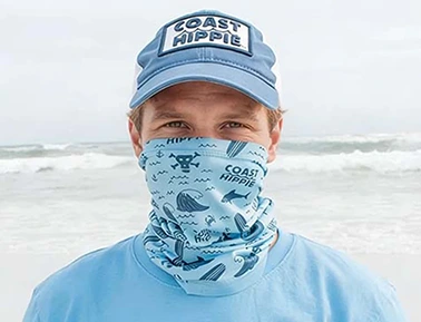A man wearing a blue summer sun hat and a light blue custom ice silk neck gaiter